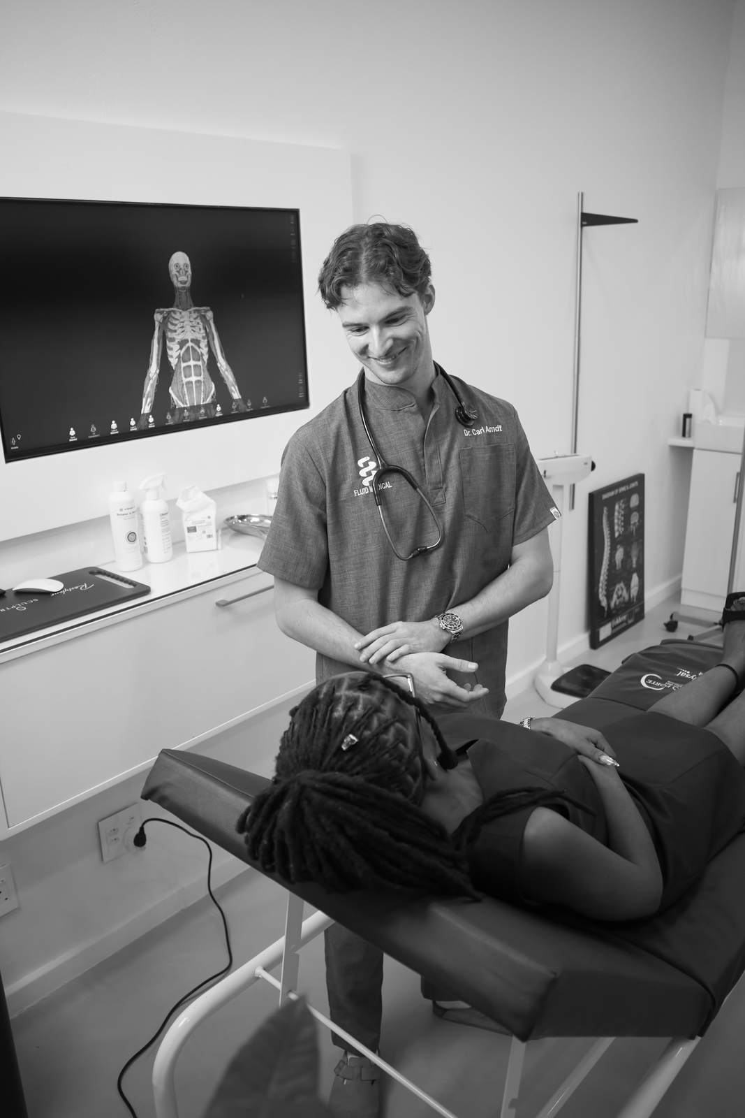 Doctor performing a natural-looking aesthetic treatment at Fluid Medical